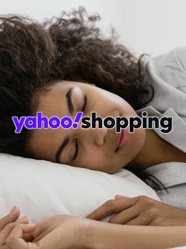 Person sleeping on a pillow peacefully.