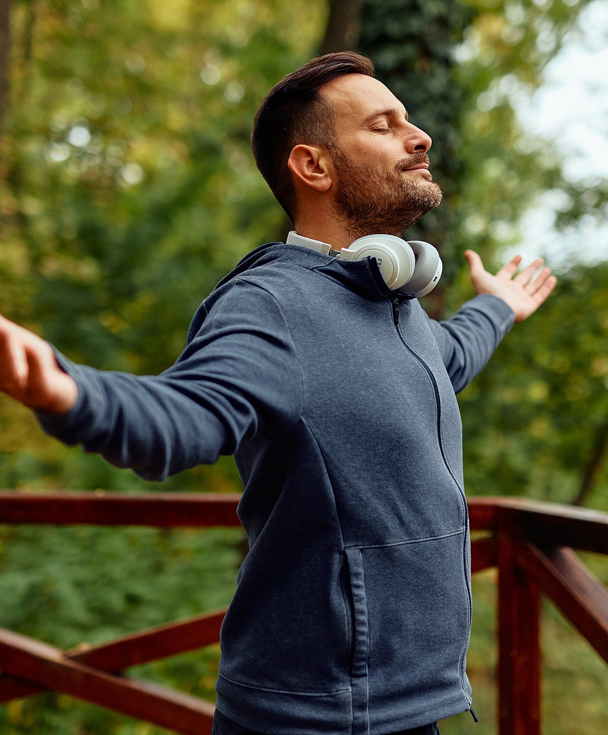 spinal stenosis enjoying nature with headphones on.