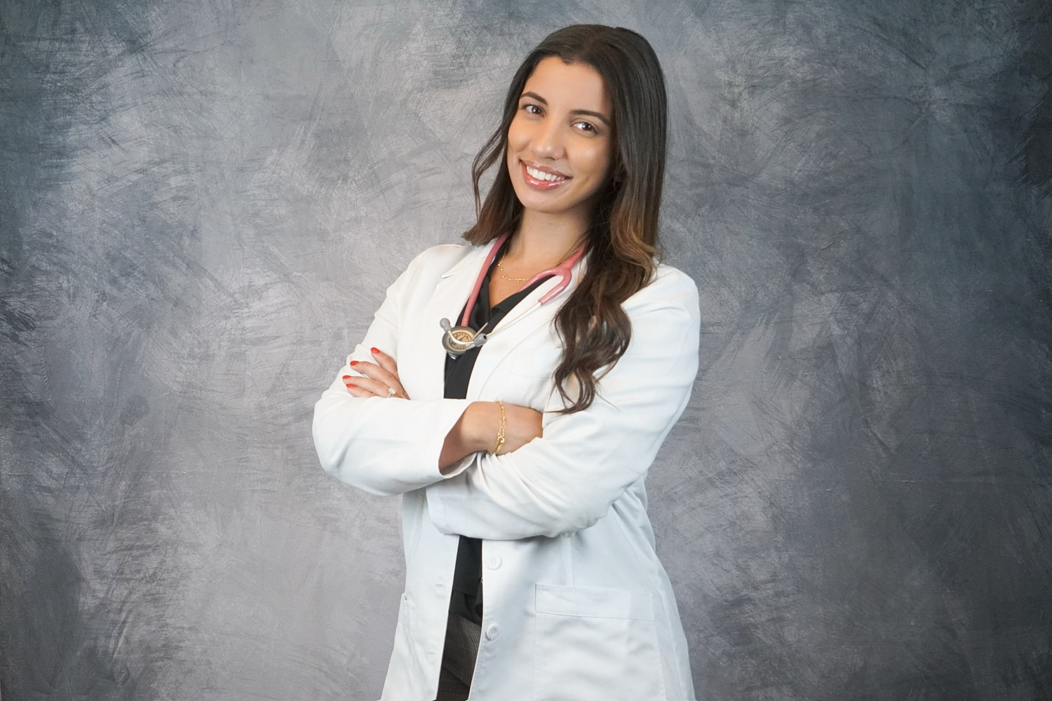 Professional woman smiling in a business suit.